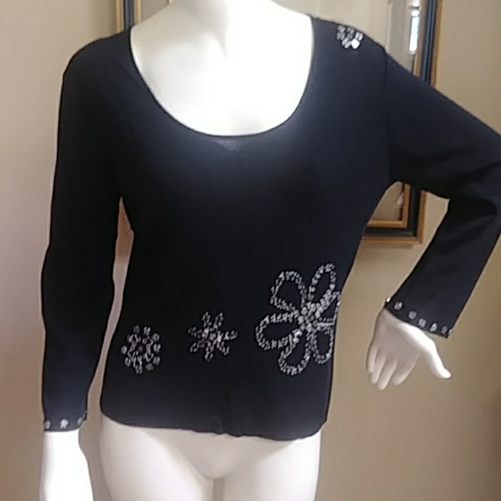 Linda Lucia black elaborated top